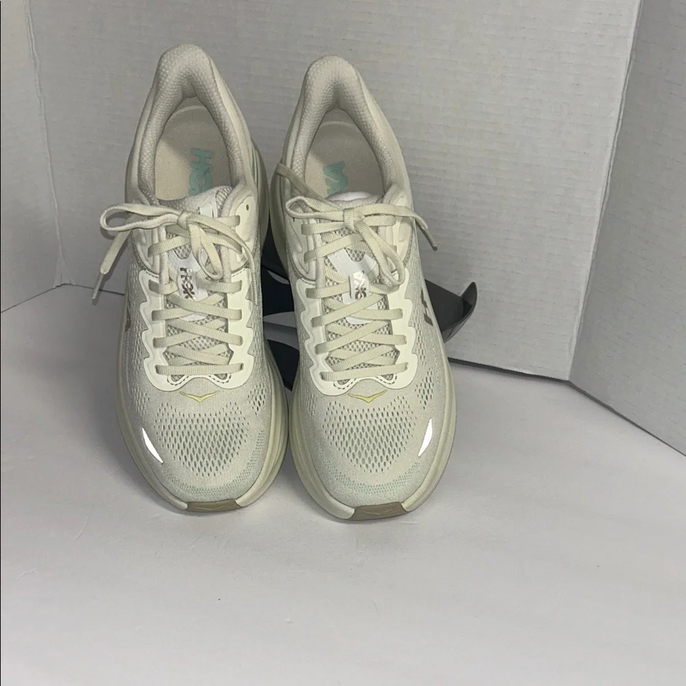 Hoka Off-White and Light Green Athletic Shoes